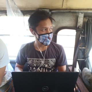 Me with a laptop on a jeepney